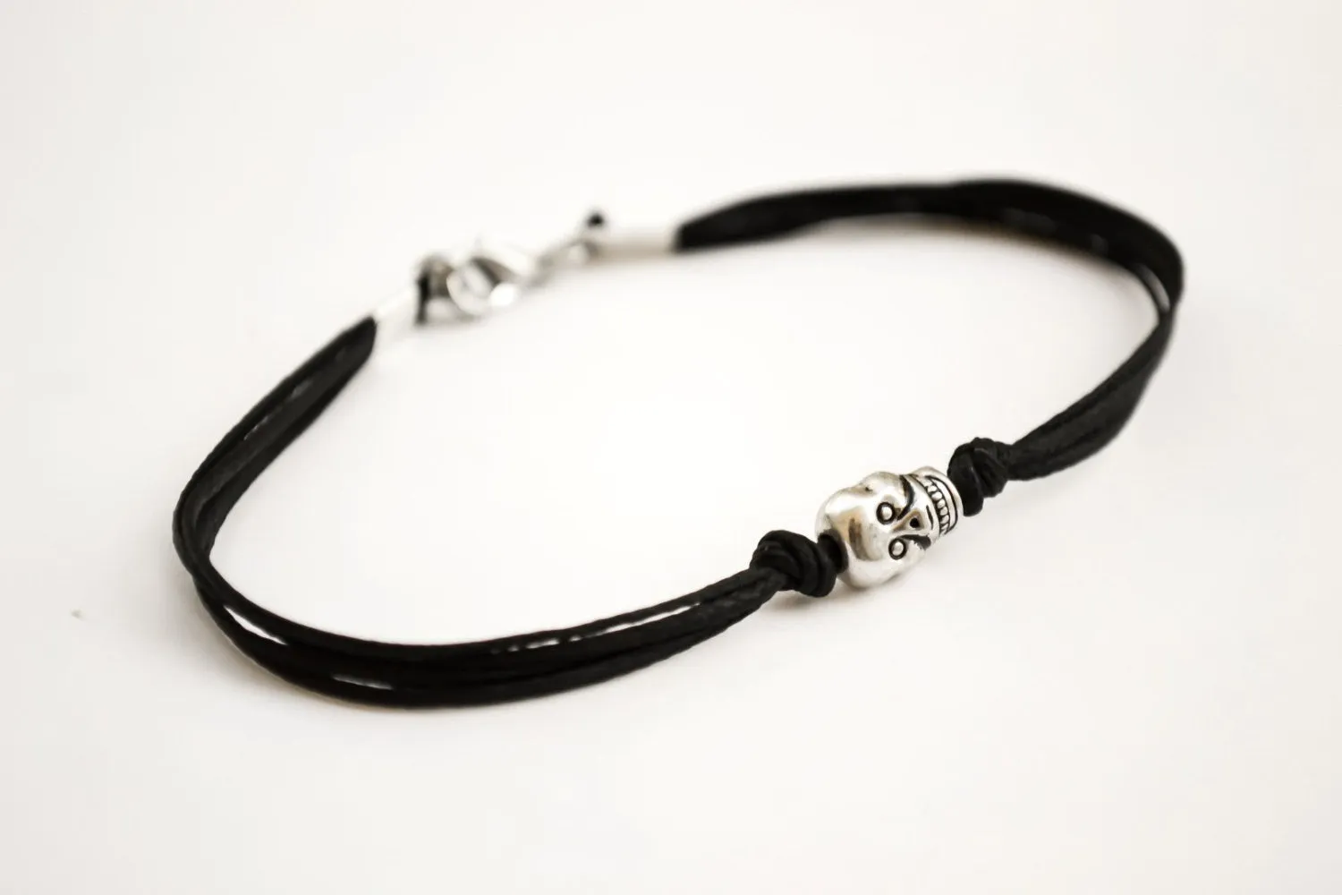 Men's bracelet with a silver skull bead charm and a black cord, gift for him
